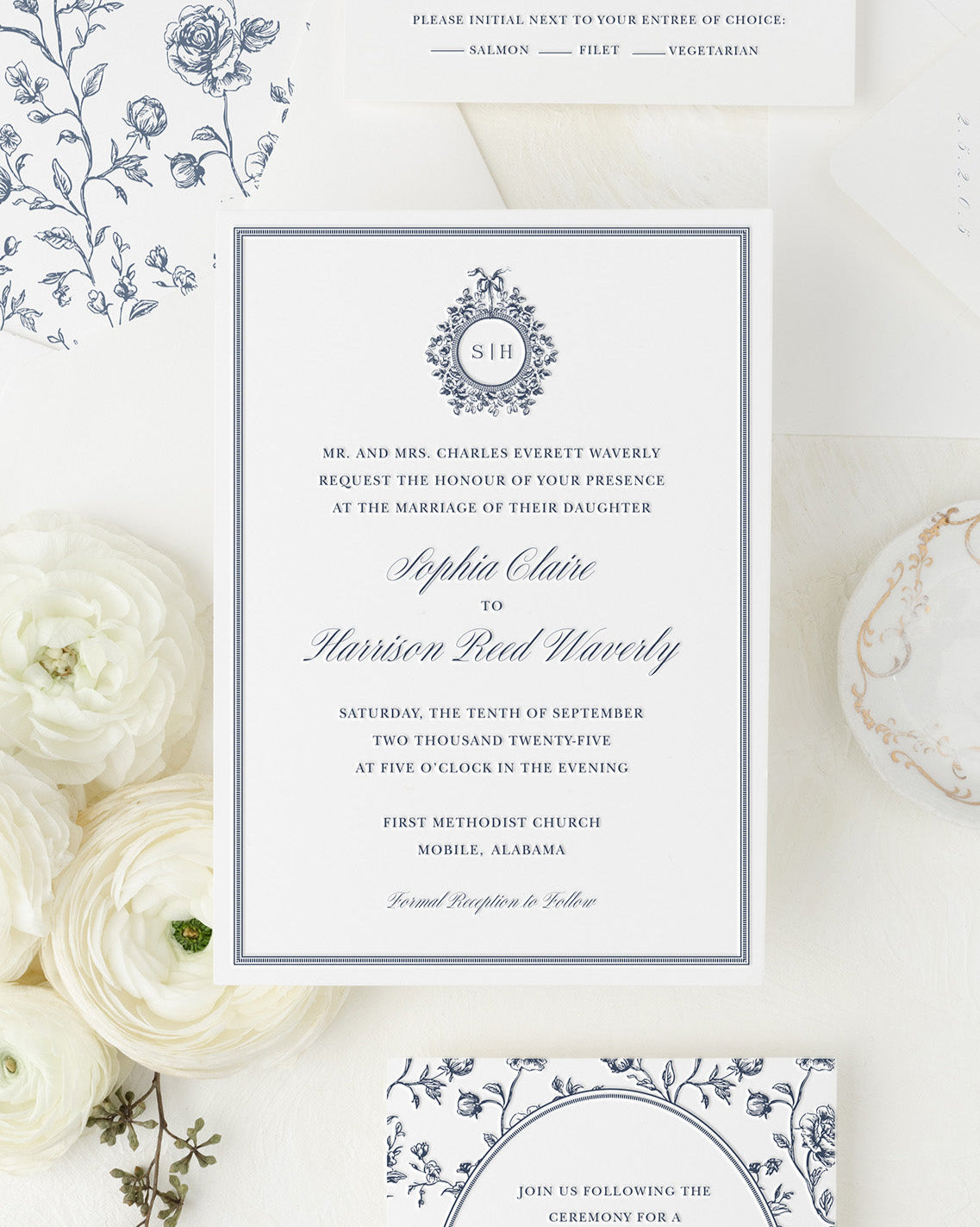 Wedding invitation card with floral design on a white background