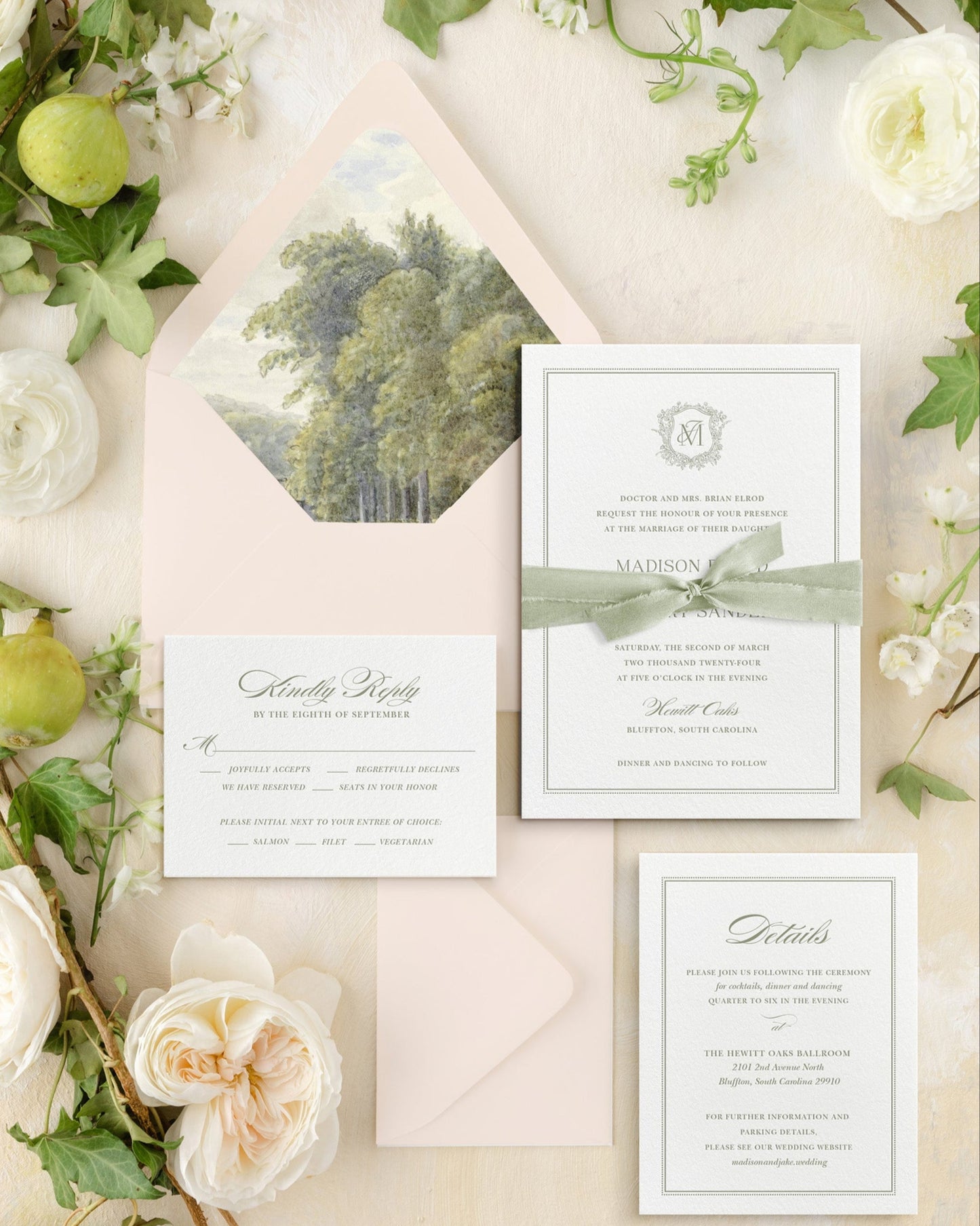 Wedding invitation set with greenery and flowers on a light background