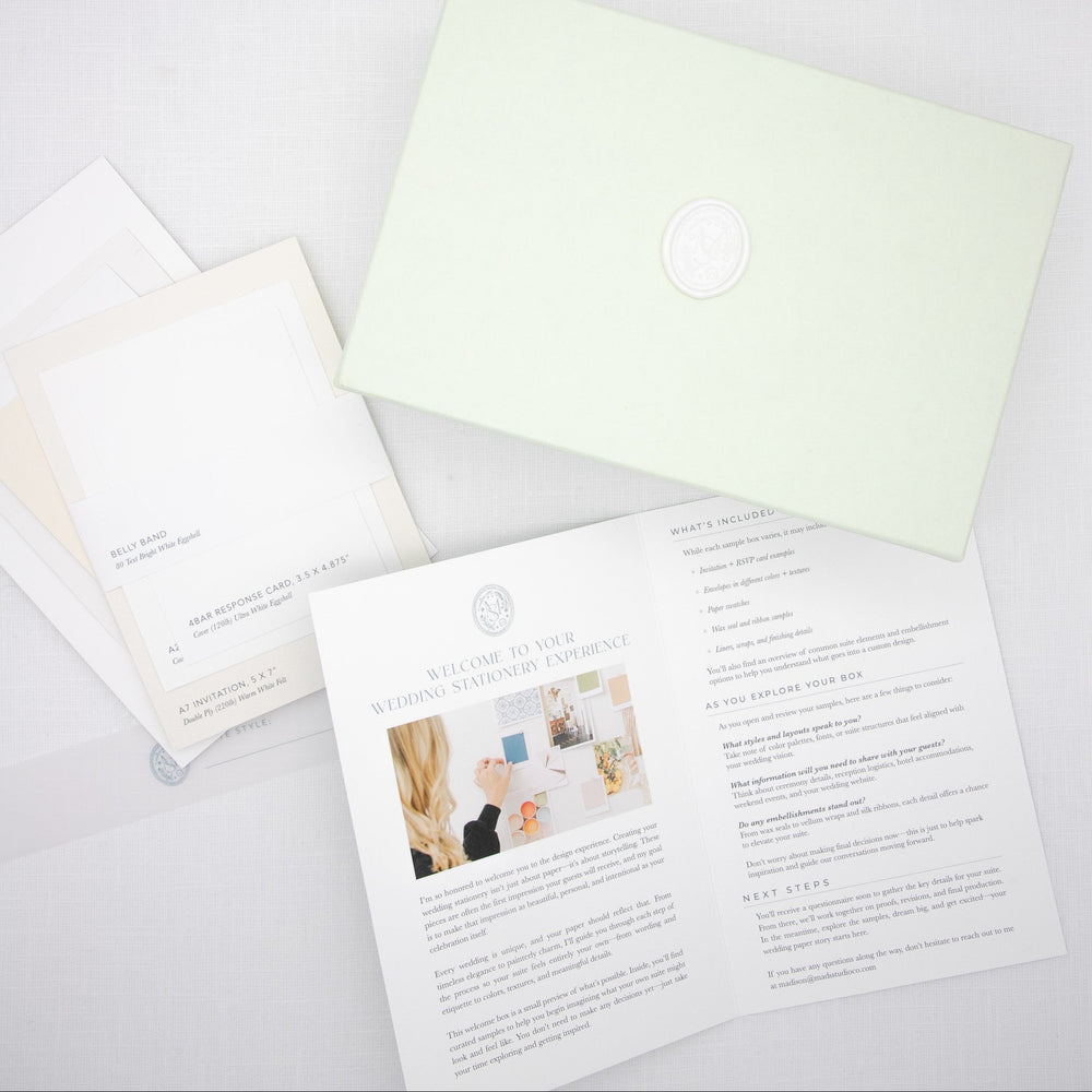 
                  
                    Set of printed materials including a informational flyer and paper color/weight samples. 
                  
                